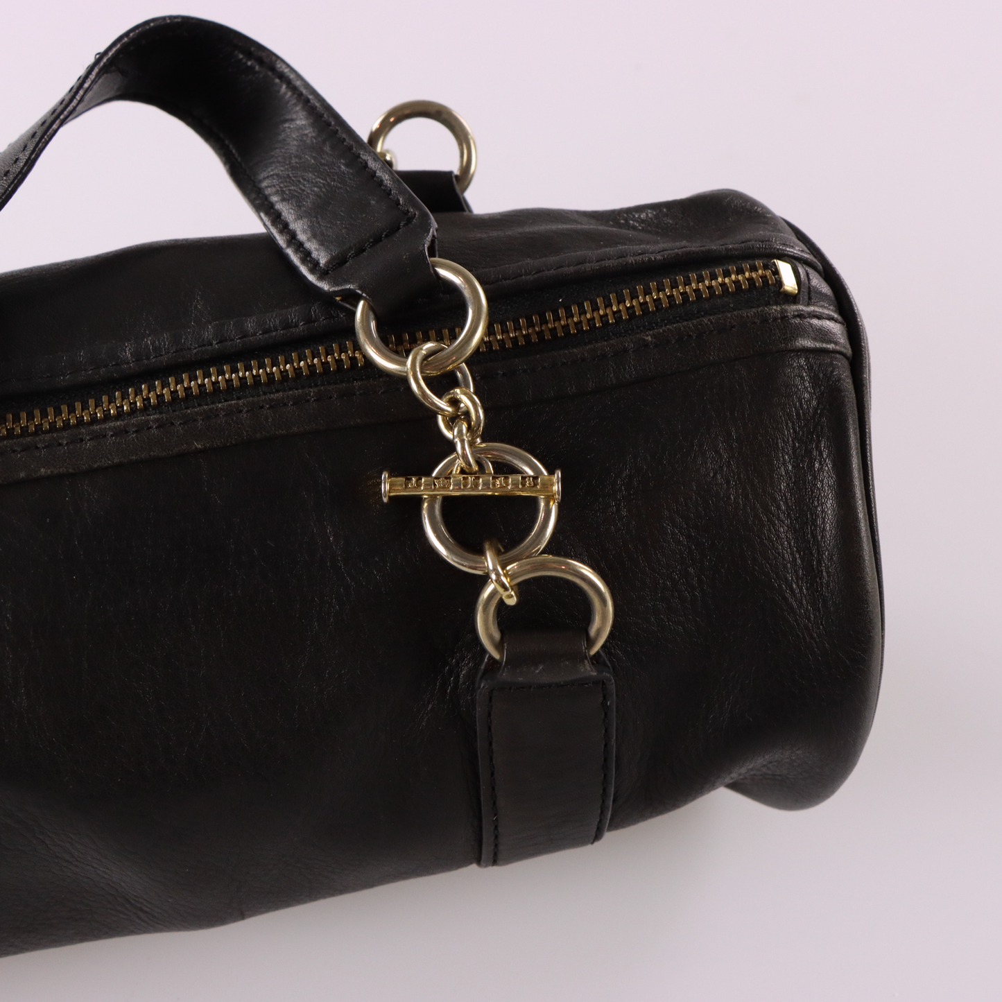 JUICY COUTURE Gold Charm Embellished Black Leather Barrel Bag