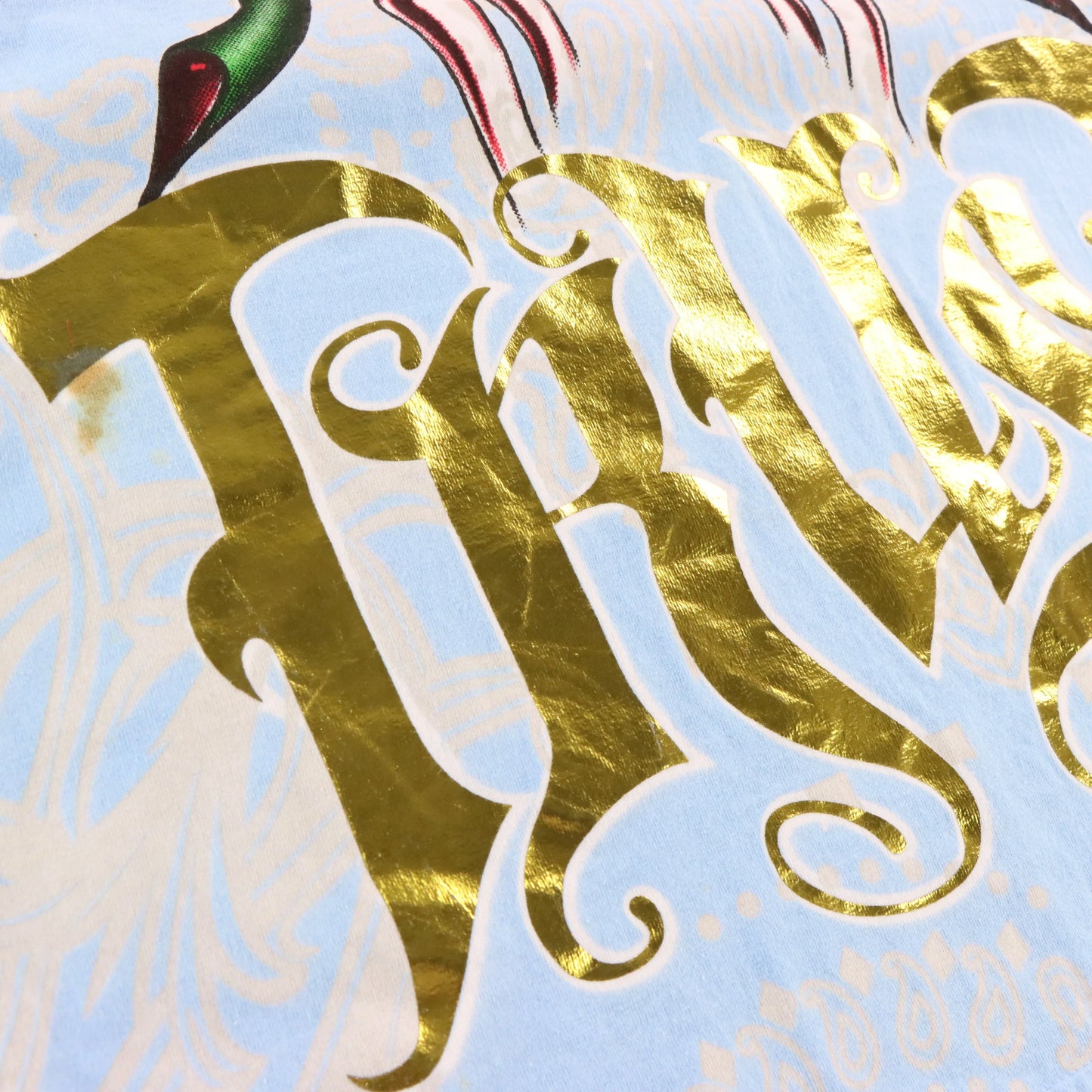 Vintage CHRISTIAN AUDIGIER "Trust" MCMVIII Light Blue & Gold Foil Paisley All Over Print Long Sleeve Tee (L-XL) Vintage Sole Melbourne