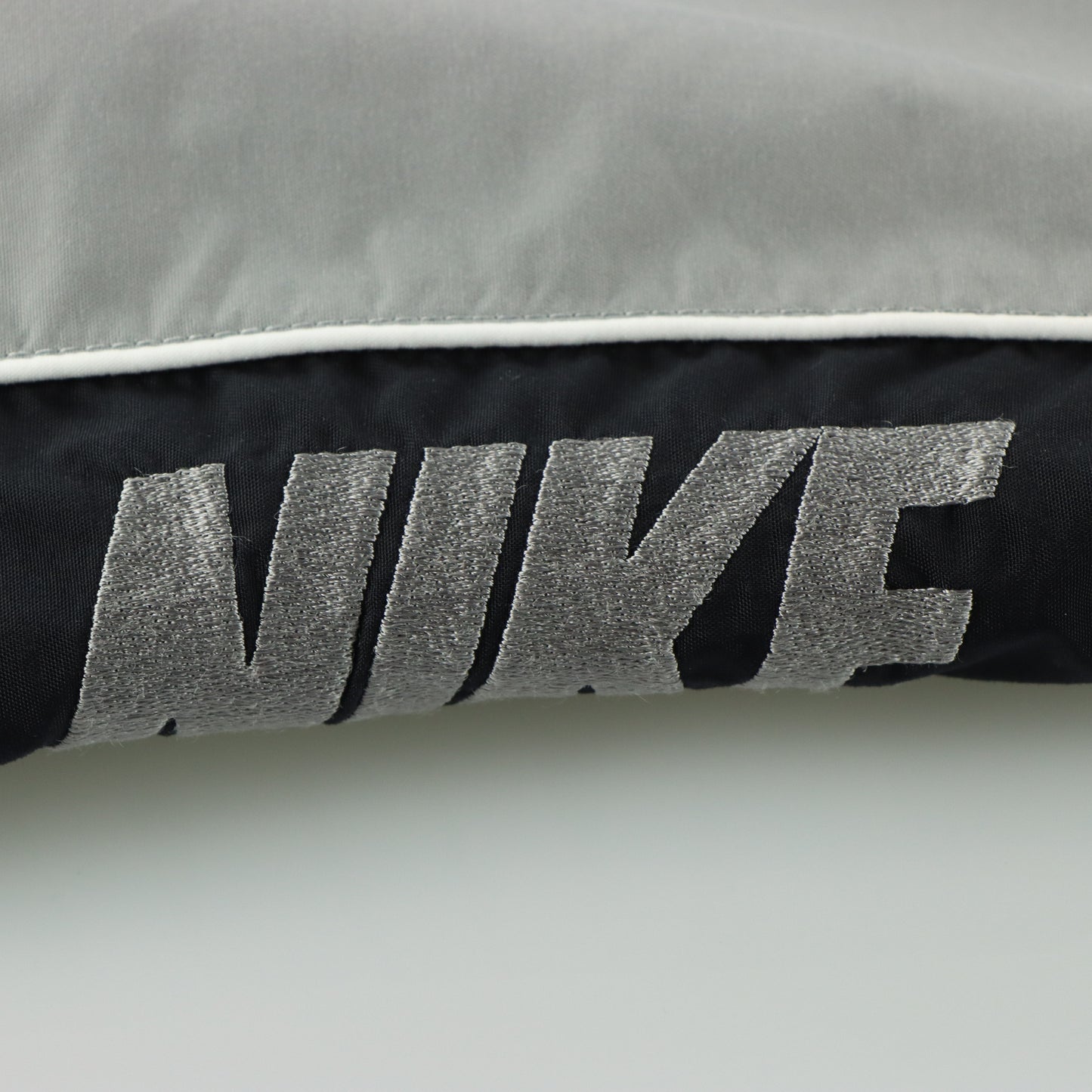 NIKE Embroidered Spell Out Logo Grey & Black Track Pants (M)