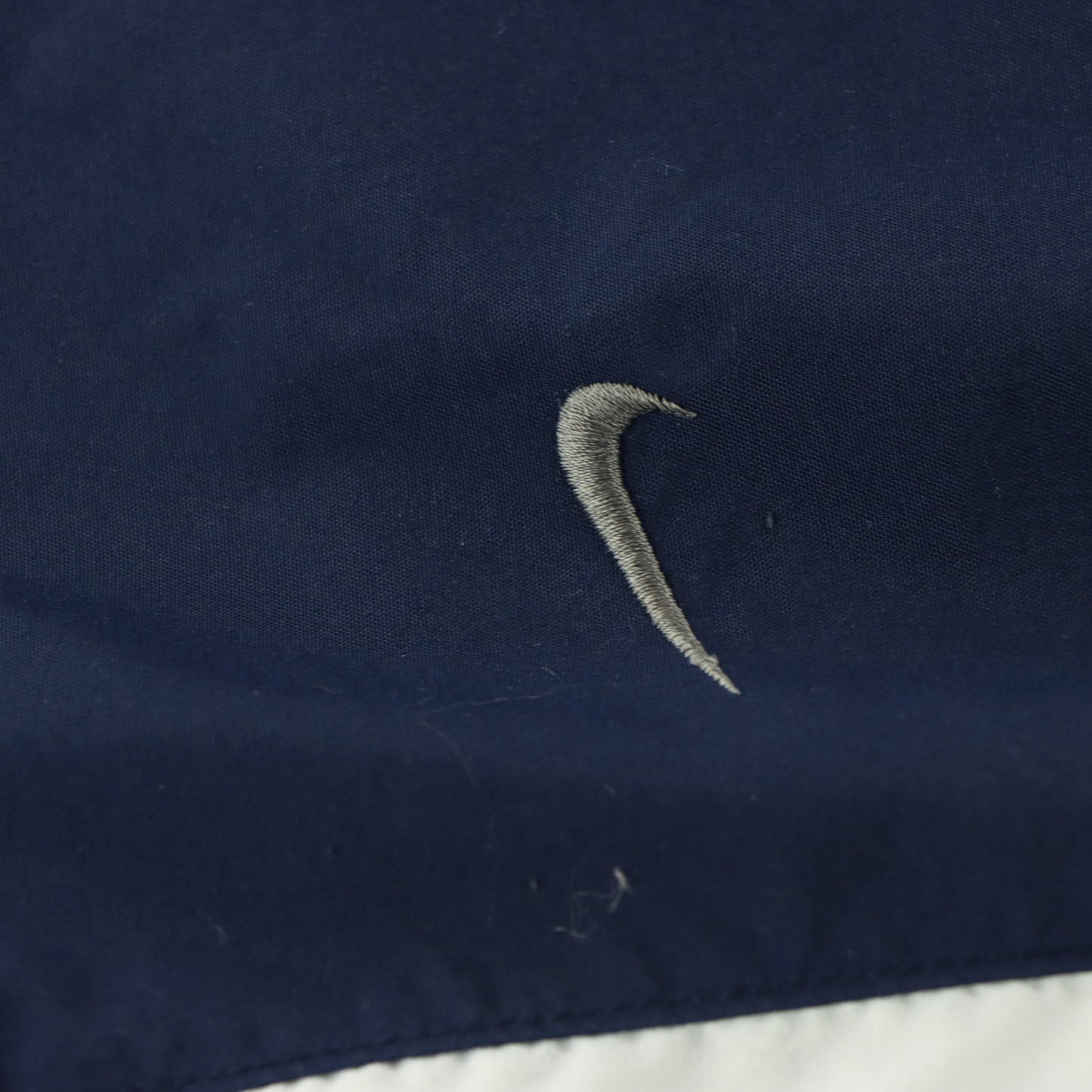 NIKE Embroidered Logo Pocket Cargo Navy & White Track Pants (L)