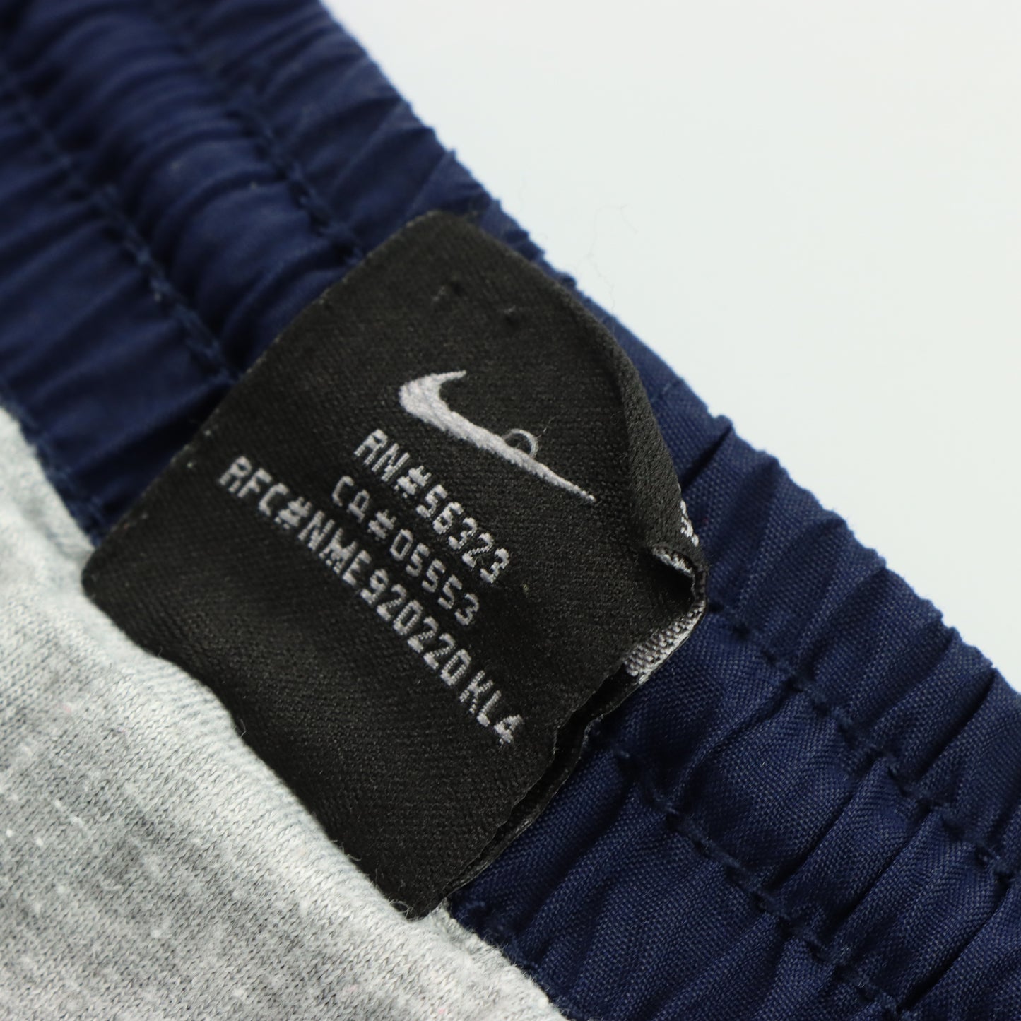 NIKE Embroidered Logo Pocket Cargo Navy & White Track Pants (L)