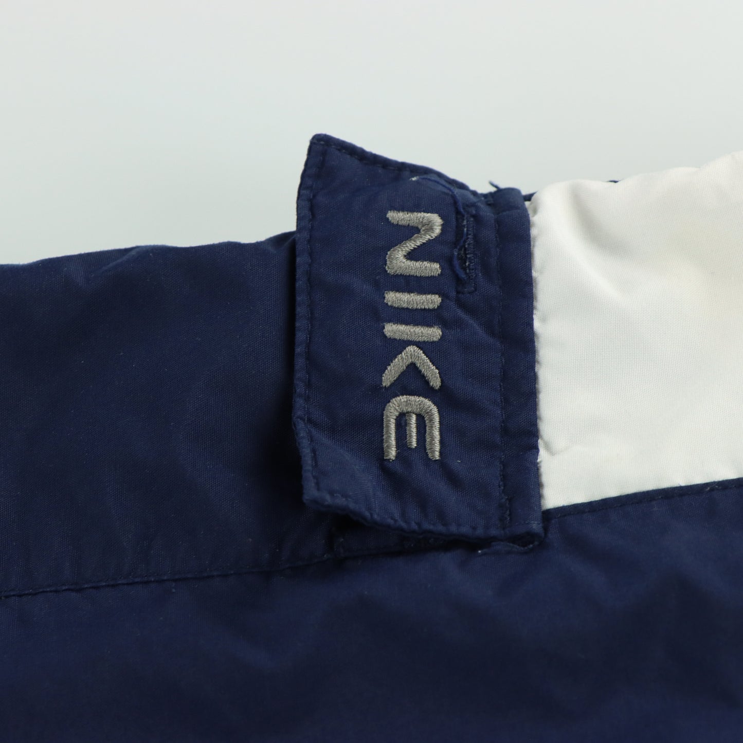 NIKE Embroidered Logo Pocket Cargo Navy & White Track Pants (L)
