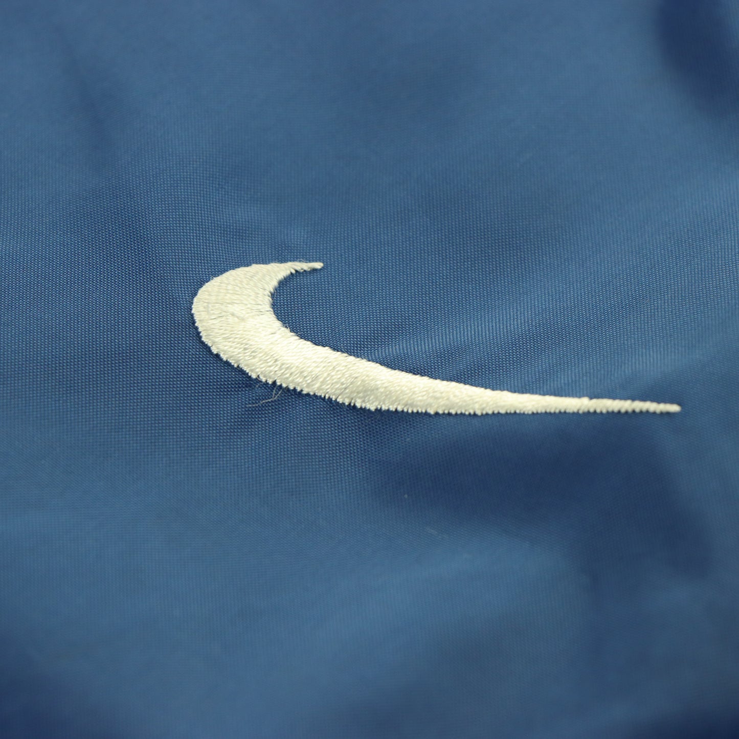 NIKE Embroidered Swoosh Logo Blue & White Zip Cuff Track Pants (L)