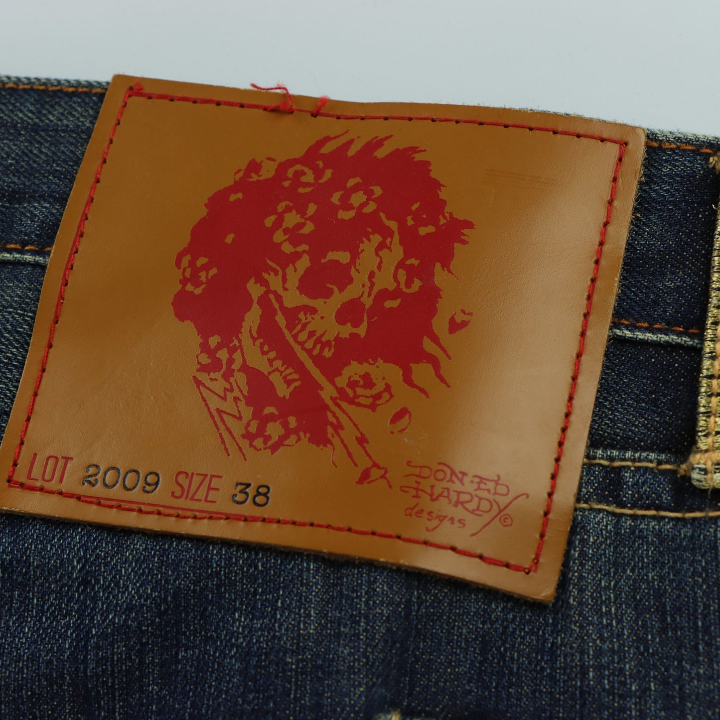 ED HARDY X CHRISTIAN AUDIGIER Embellished Skull Pocket Distressed Jeans (38)