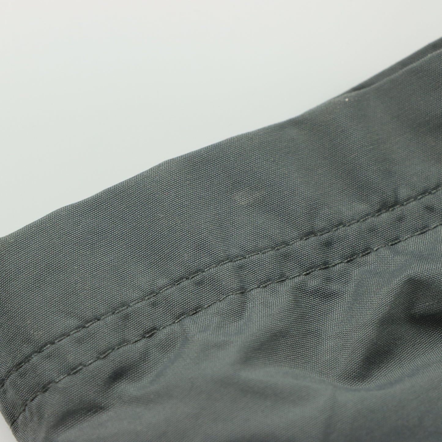 NIKE Embroidered Spell Out Logo Swoosh Parachute Grey Track Pants (L)