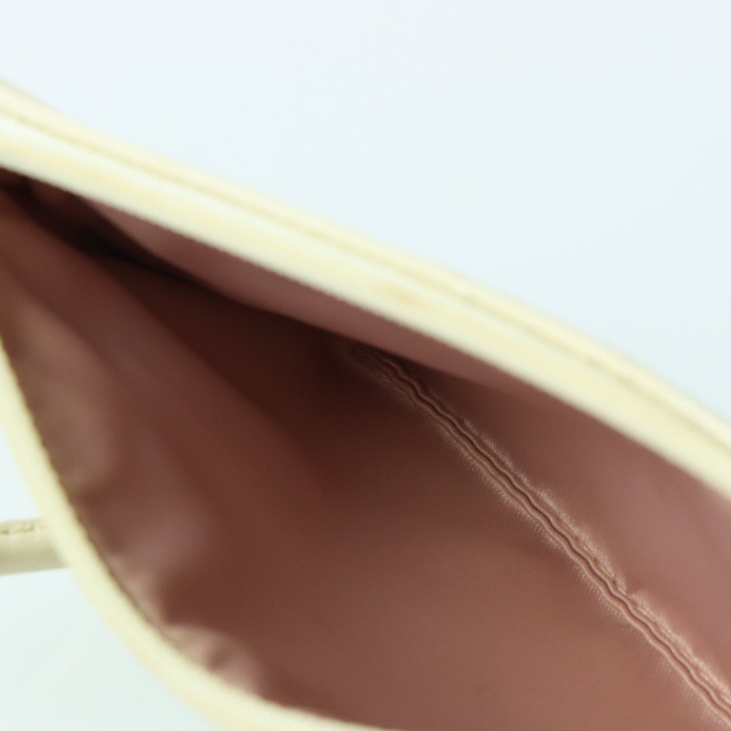 COACH Cream & Silver Rose Outline Wristlet