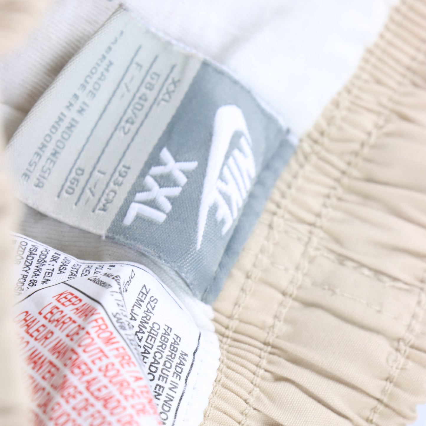 Vintage NIKE Beige Embroidered Swoosh Track Pants (XXL) Vintage Sole Melbourne