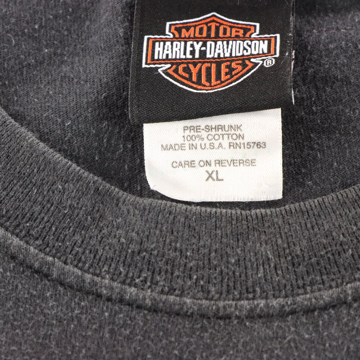HARLEY DAVIDSON "100 Years And Still Evolving!" Cayman Islands Pirate Faded Black Tee USA Made (XL)