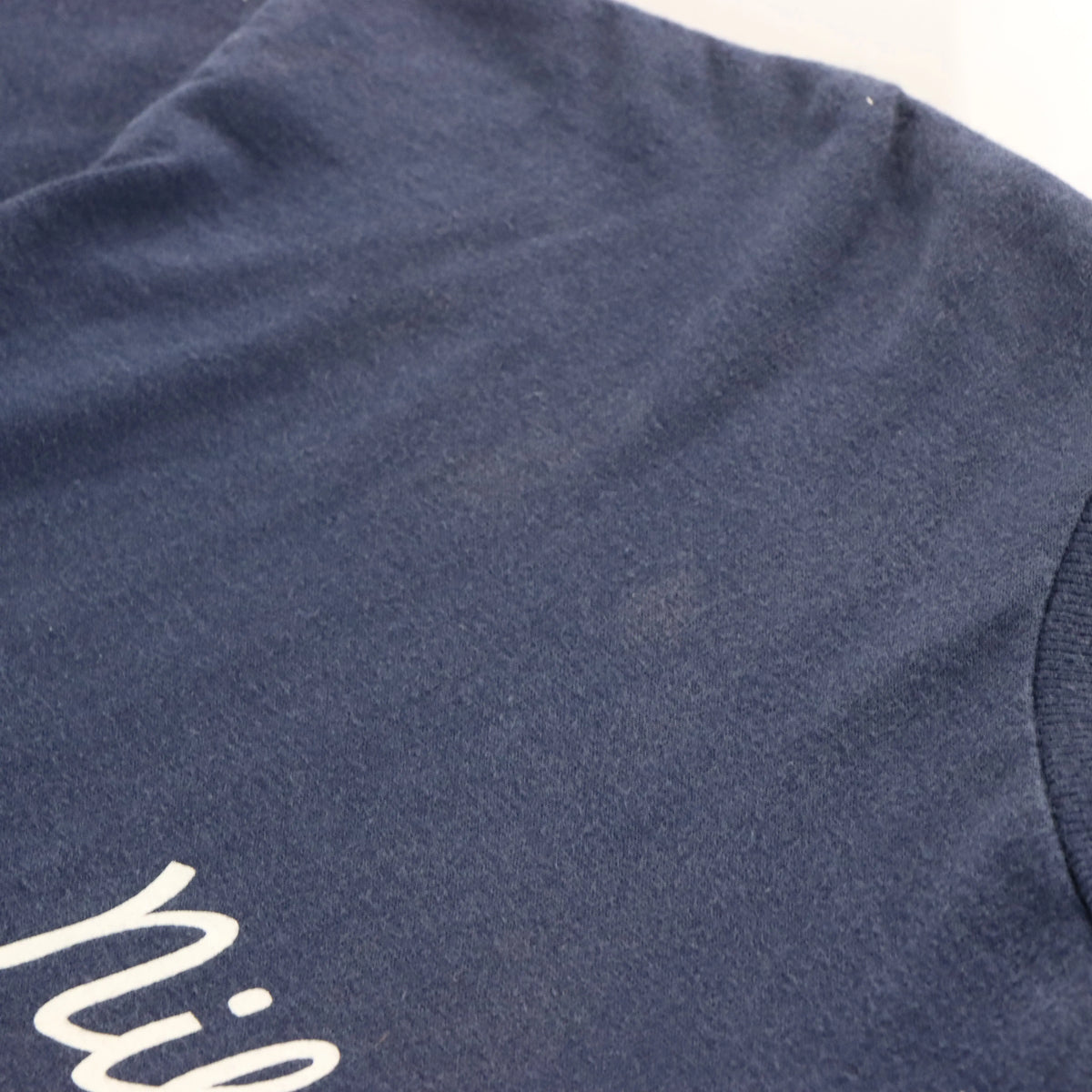 Vintage NIKE ATHLETICA Swoosh Cursive Spell Out Logo Navy & White T-Shirt (XL)