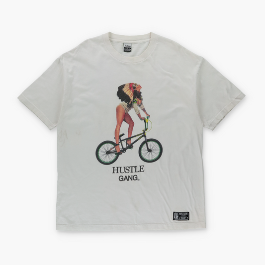 HUSTLE GANG Native American Headdress & Stilettos on Bicycle White T-Shirt (XL)