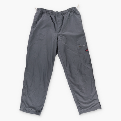 NIKE Embroidered Spell Out Logo Swoosh Parachute Grey Track Pants (L)