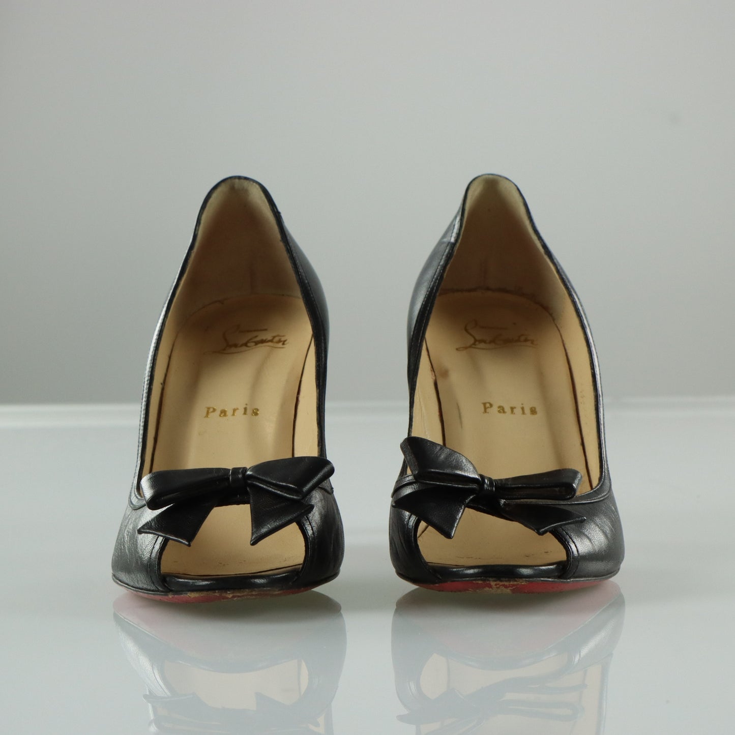 CHRISTIAN LOUBOUTIN Black Leather Bow Italian Made Peep Toe Stiletto Heels (37)