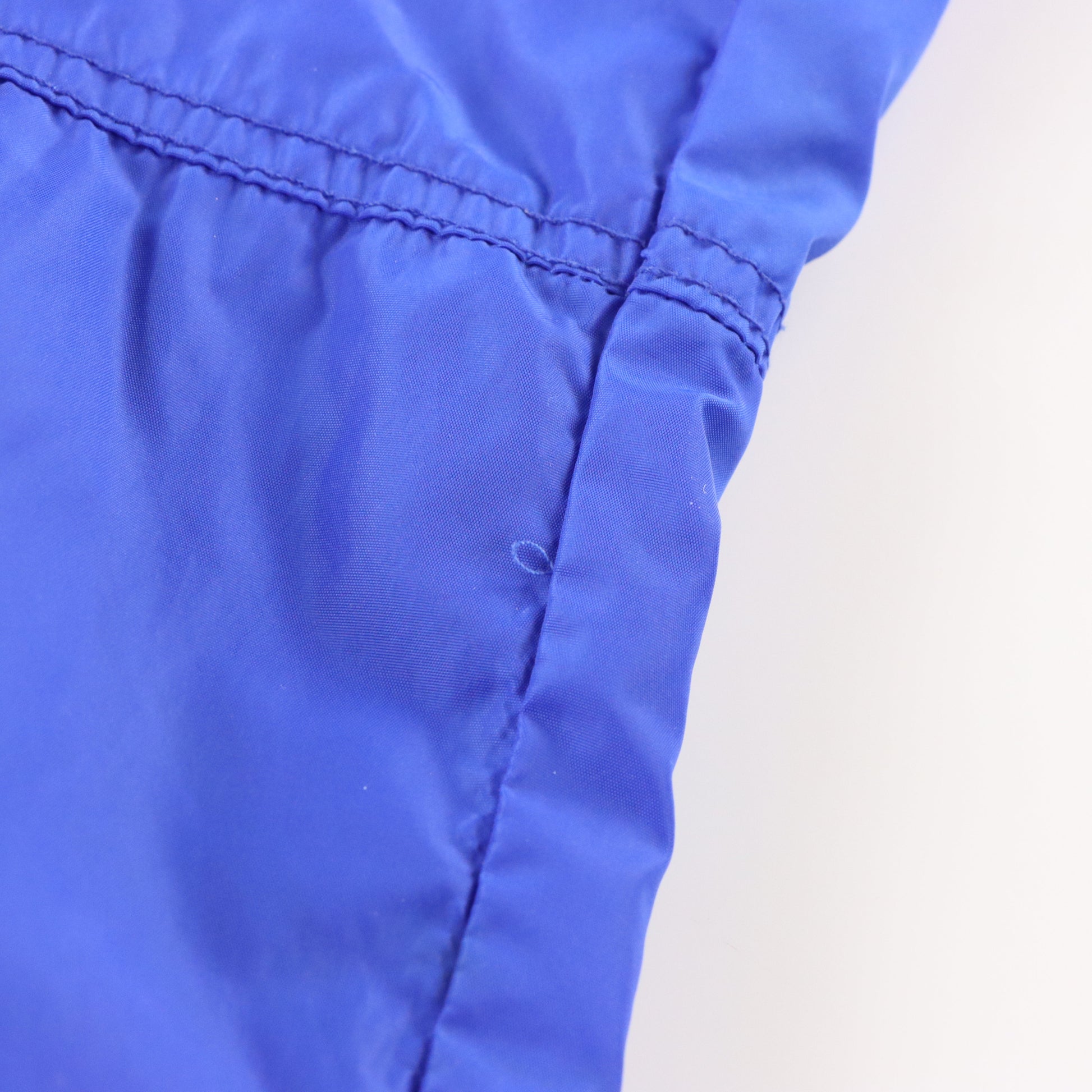 Vintage NIKE Blue & White Embroidered Logo Ankle Zip Mesh Lined Track Pants (M) ***COCO Vintage Sole Melbourne