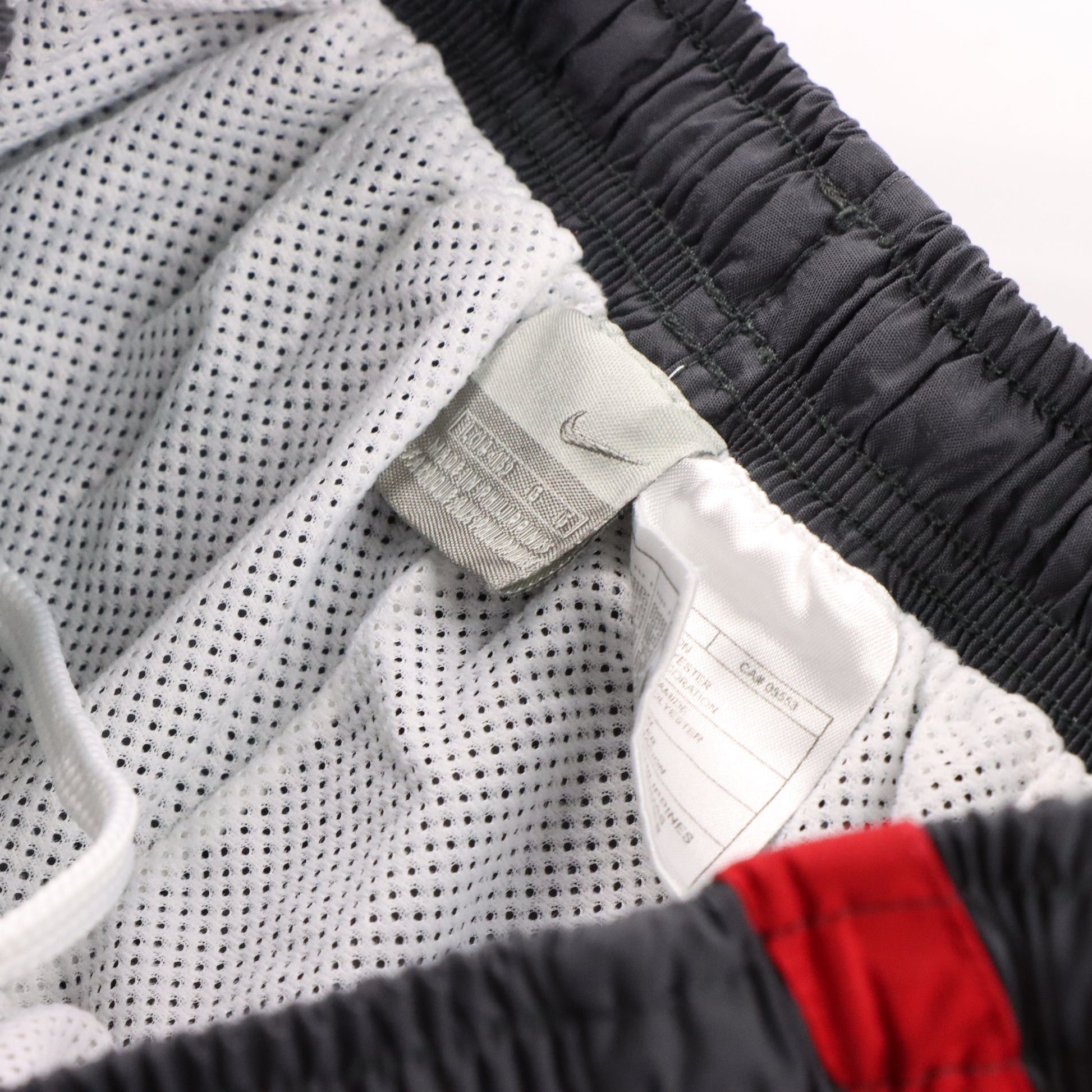 Vintage NIKE Swoosh Grey & Red Stripe Track Pants (S) *Aubs Vintage Sole Melbourne