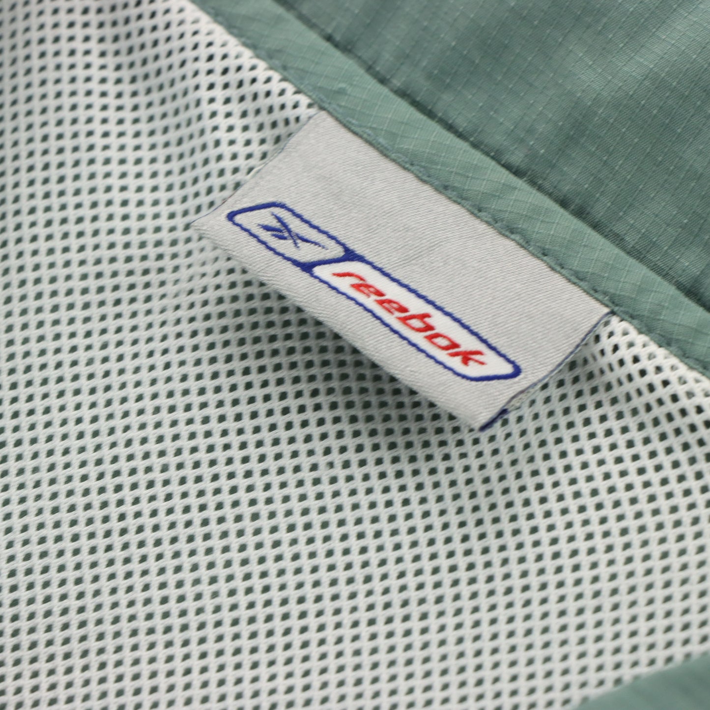 REEBOK Embroidered Spell Out Logo Athletic Windbreaker Coat Jacket (XL)