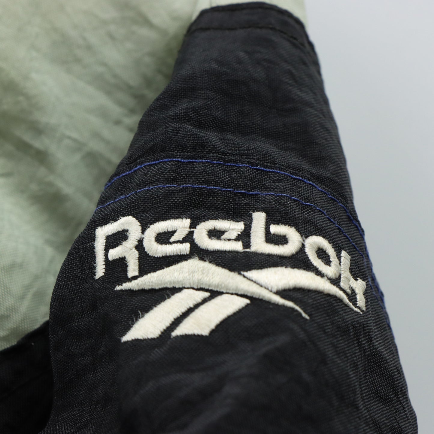 REEBOK Dallas Cowboys Football Embroidered Hooded NFL Windbreaker Jacket (L)