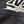 NIKE Athletics Spell Out Logo Black Loose Fit T-Shirt (M-L)