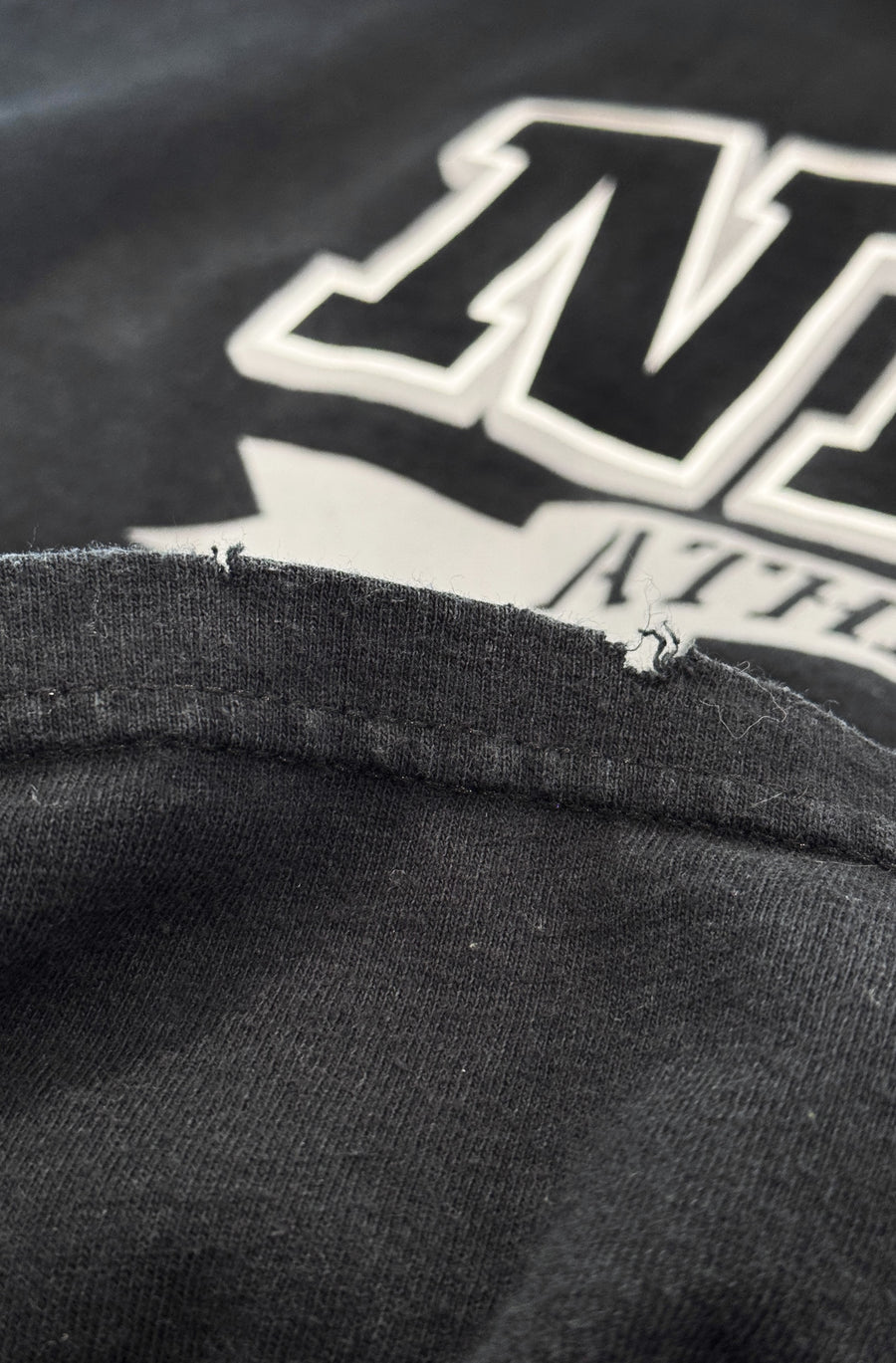 NIKE Athletics Spell Out Logo Black Loose Fit T-Shirt (M-L)