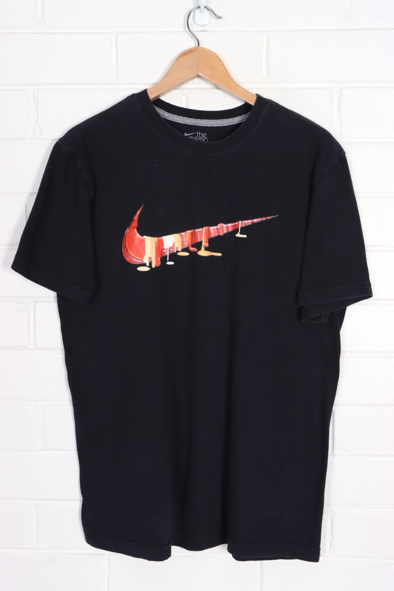 Black nike shirt with red best sale swoosh